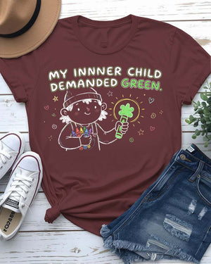 My Inner Child Demanded Green St. Patrick's Day Tee with jumping kid silhouette on model