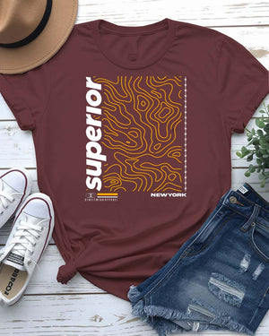Superior Streetwear Tee with crown floating above mountain peak on model