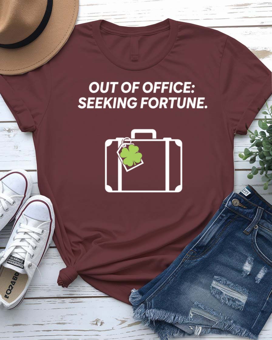 Out of Office Seeking Fortune St. Patrick's Day Tee with shamrock laptop on model