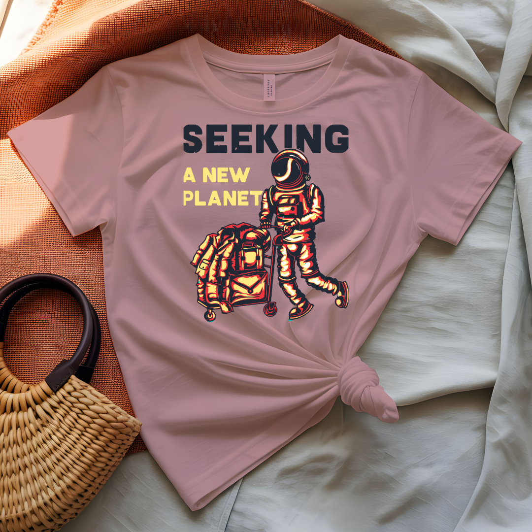 Seeking a New Planet astronaut drifting toward distant world graphic tee on model