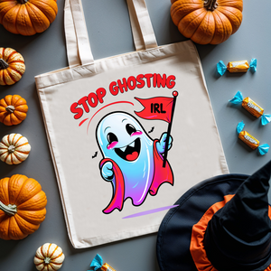 “Stop Ghosting IRL Halloween tote bag with ghost illustration and meme-style typography on cotton canvas.”