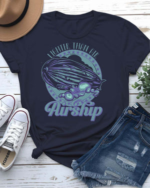 Air Ship Tee with vintage zeppelin drifting through clouds on model