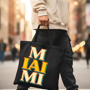 Vibrant Miami souvenir tote bag at the beach or poolside