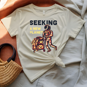 Seeking a New Planet astronaut drifting toward distant world graphic tee on model