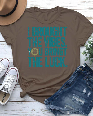 I Brought The Vibes St. Patrick's Day Tee with radiating pint glass on model