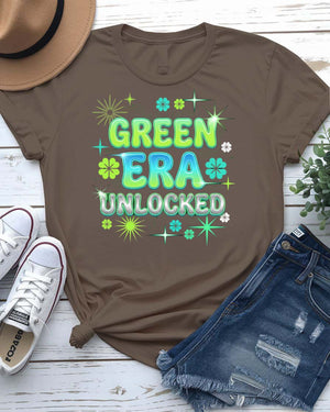 Green Era Unlocked St. Patrick's Day Tee with shamrock progress bar on model