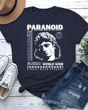 Paranoid Streetwear Tee with all-seeing eye behind chain link fence on model