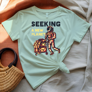 Seeking a New Planet astronaut drifting toward distant world graphic tee on model