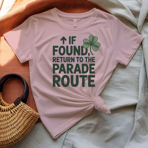 If Found Return to Parade St. Patrick's Day Tee with vintage luggage tag on model