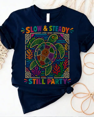 Slow and steady t-shirt with determined turtle crossing finish line design