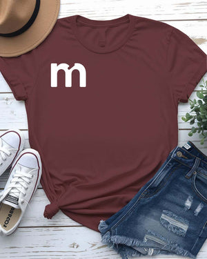 Alphabetical Letter M Funny Typographical Tee displayed on unisex t-shirt