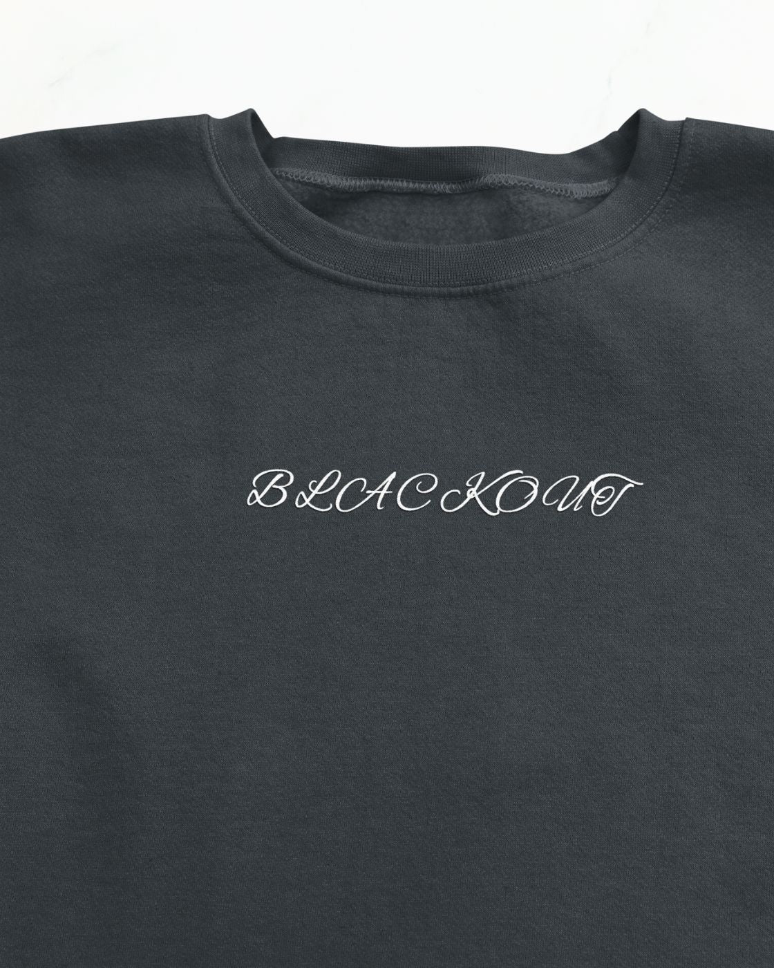 "Unisex Blackout Halloween Sweatshirt styled outfit"