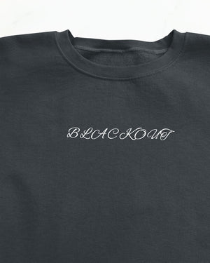 "Unisex Blackout Halloween Sweatshirt styled outfit"