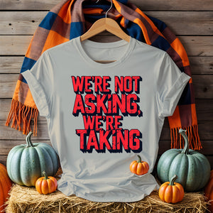 Black unisex t-shirt with bold white text “We Are Not Asking, We Are Taking” by Memez Store – protestwear meets meme culture