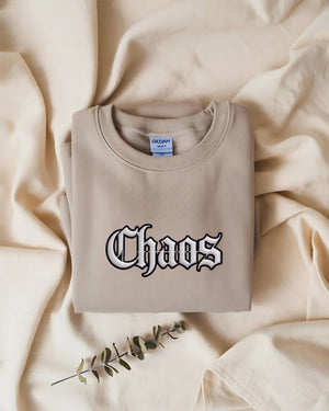 Streetwear embroidered sweatshirt with chaos text design"
