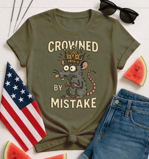 Crowned by Mistake Funny Tee by Memez Store – black t-shirt with cartoon crown graphic and meme text.