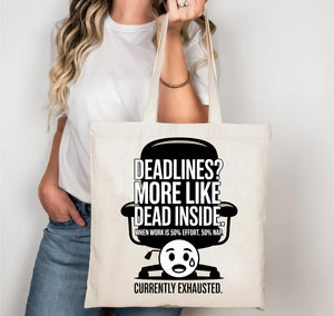 Deadlines Is More Like Dead Inside canvas tote bag with bold black‑humor typography by Memez Store