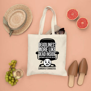 Deadlines Is More Like Dead Inside canvas tote bag with bold black‑humor typography by Memez Store