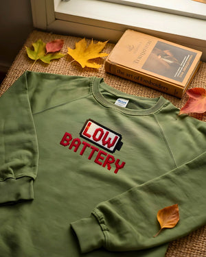 Funny unisex embroidered sweatshirt – low battery humor design