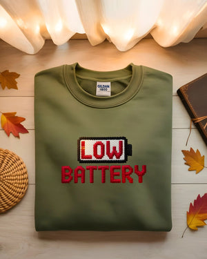 Funny unisex embroidered sweatshirt – low battery humor design