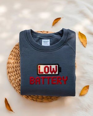 Funny unisex embroidered sweatshirt – low battery humor design