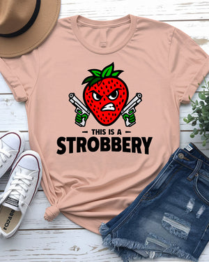 Unisex model laughing while wearing “This is Strobbery” tee