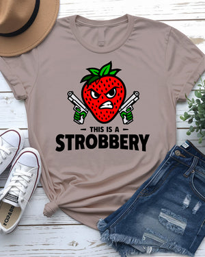 Unisex model laughing while wearing “This is Strobbery” tee