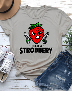 Unisex model laughing while wearing “This is Strobbery” tee
