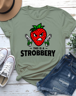Unisex model laughing while wearing “This is Strobbery” tee