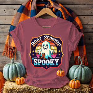 Funny Halloween Meme Tee in black with humorous text design, worn by a smiling adult with Halloween decor in the background – Memez Store unisex apparel