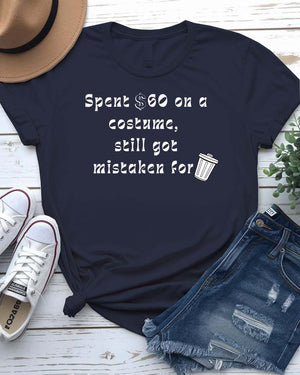 Funny Halloween shirt with bold text reading “Spent $60 on This Costume” in large, clean font on a black unisex tee.