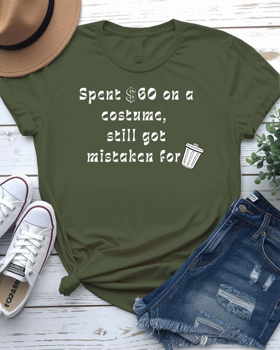 Funny Halloween shirt with bold text reading “Spent $60 on This Costume” in large, clean font on a black unisex tee.