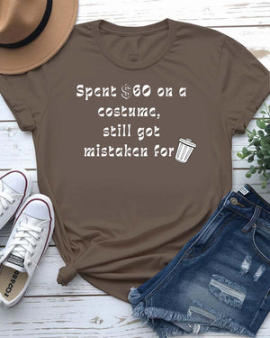 Funny Halloween shirt with bold text reading “Spent $60 on This Costume” in large, clean font on a black unisex tee.