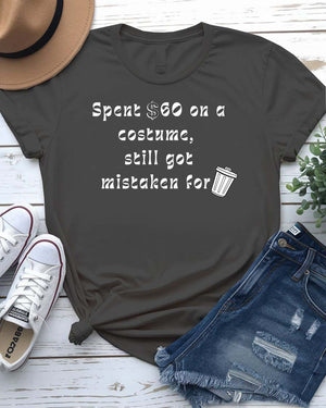 Funny Halloween shirt with bold text reading “Spent $60 on This Costume” in large, clean font on a black unisex tee.