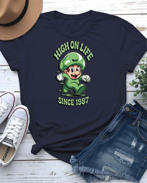 Funny High On Life meme T-shirt with bold typographic text, worn casually with a smile and relaxed posture.