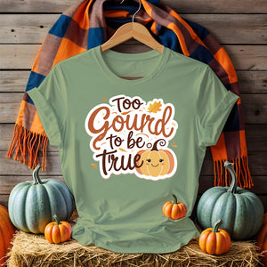 Funny unisex Halloween t-shirt featuring meme-style graphics with pumpkins, ghosts, and sarcastic text, displayed flat with spooky décor (1)