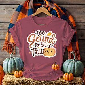 Funny unisex Halloween t-shirt featuring meme-style graphics with pumpkins, ghosts, and sarcastic text, displayed flat with spooky décor (1)