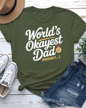 Funny unisex T-shirt featuring the bold typographic phrase “World’s Okayest Dad” in a clean, eye-catching font.