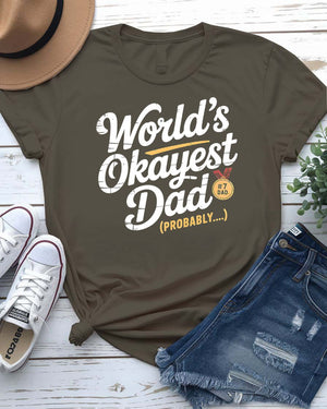 Funny unisex T-shirt featuring the bold typographic phrase “World’s Okayest Dad” in a clean, eye-catching font.