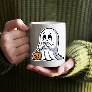 “Ceramic Halloween mug with pumpkin and ghost design