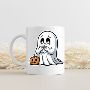 Funny ceramic Halloween mug on desk”