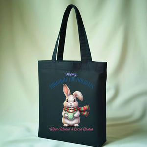 Hopping Through Holidays Tote Bag with cute bunny in winter gear