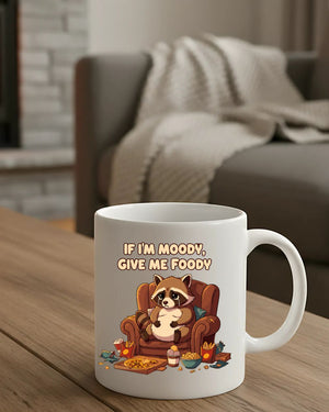 Moody raccoon ceramic mug with bold text design