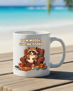 Moody raccoon ceramic mug with bold text design