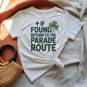 If Found Return to Parade St. Patrick's Day Tee with vintage luggage tag on model