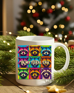 In My Feral Era Raccoon Mug – Funny ceramic coffee cup with chaotic raccoon meme design.