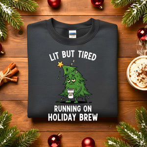 “Lit But Tired Christmas Sweatshirt – funny holiday meme sweatshirt for exhausted coffee lovers, cozy unisex fleece pullover from Memez.Store.