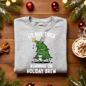 “Lit But Tired Christmas Sweatshirt – funny holiday meme sweatshirt for exhausted coffee lovers, cozy unisex fleece pullover from Memez.Store.
