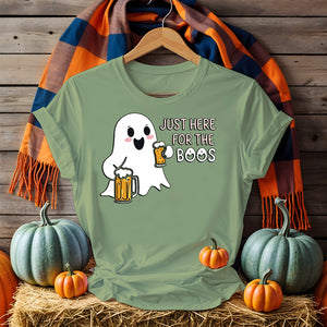 Model laughing in “Just for the Boos” tee holding a drink