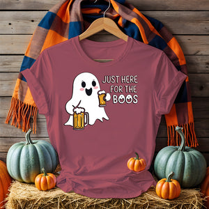 Model laughing in “Just for the Boos” tee holding a drink